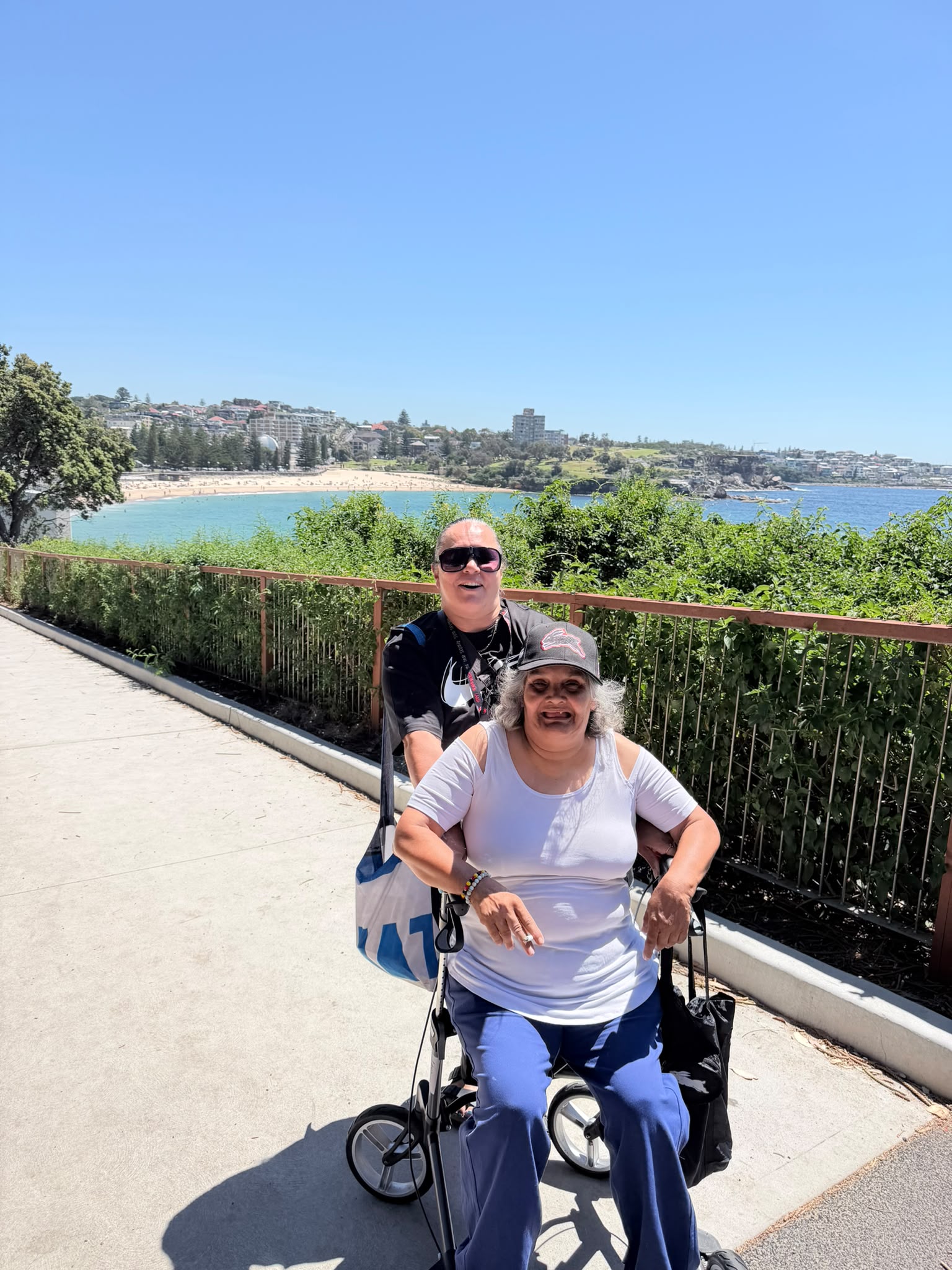 An Aboriginal support worker and participant together on the Sydney coastal walk