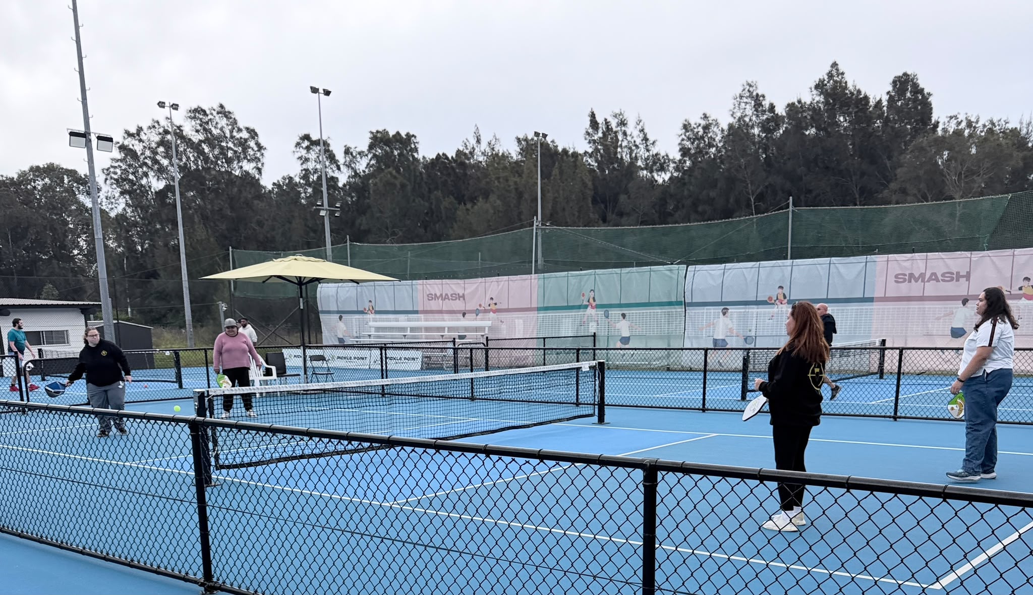 The Tegrity rec group spread across the courts at Pickle Point Sydney